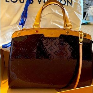 Beautiful merlot colored patent bag